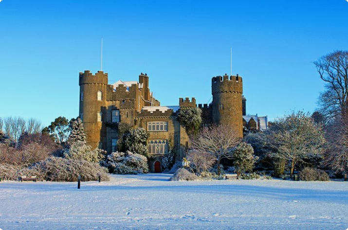 Snow-covered Malahide Castle in County Dublin